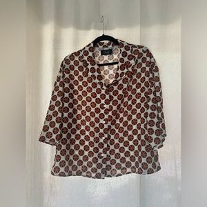 70’s inspired blouse in size medium in perfect condition.